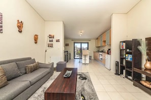 Basic Apartment, Multiple Beds | Living area