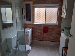 Shower, hair dryer, towels, soap