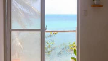 Habitación doble Confort, vista al océano, frente al océano | Vista a la playa o el mar