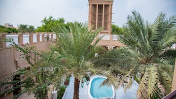 Suite Deluxe, 1 cama Queen size, vista al mar | Terraza o patio