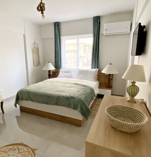 2 habitaciones, insonorización y tabla de planchar con plancha 