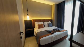 Suite Standard, 1 chambre | Draps en coton égyptien, literie de qualité supérieure, minibar