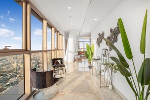 Deluxe Penthouse | Living area | 65-inch Smart TV with cable channels, TV - GreenFuture - A A Tower - Two beedroms (Dubai)