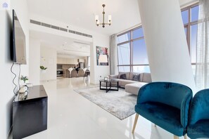 65-inch Smart TV with cable channels, TV - GreenFuture - A A Tower - Two beedroms (Dubai)