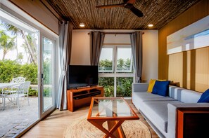 Junior Villa One Bedroom | Living area | 42-inch Smart TV with cable channels - Koh Apikjun Resort by EHM (Kiri Sakor)