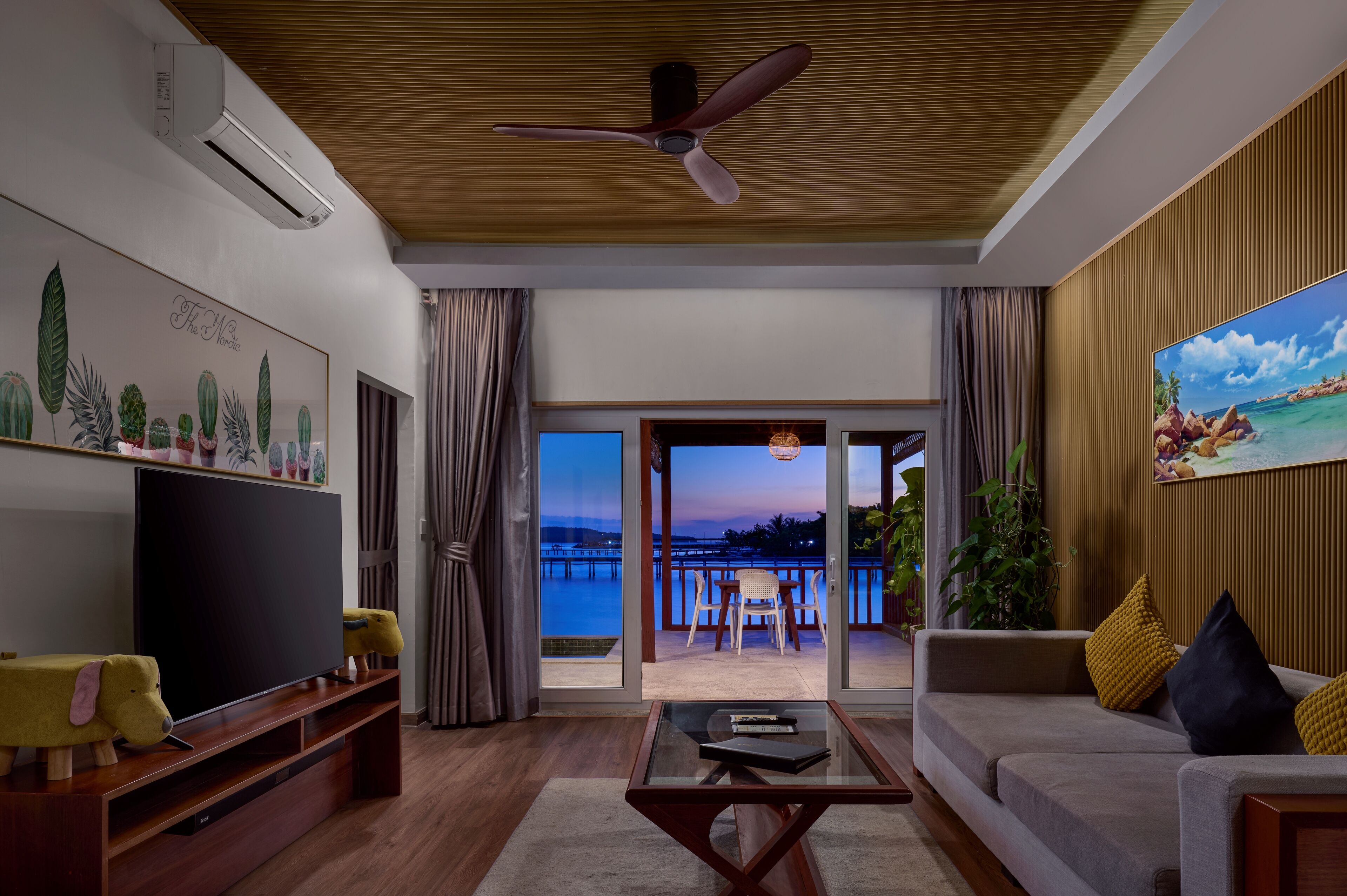 Elite Villa King Bed | Living room | 42-inch Smart TV with cable channels