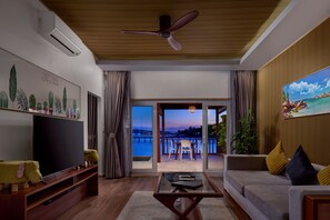 Elite Villa King Bed | Living room | 42-inch Smart TV with cable channels