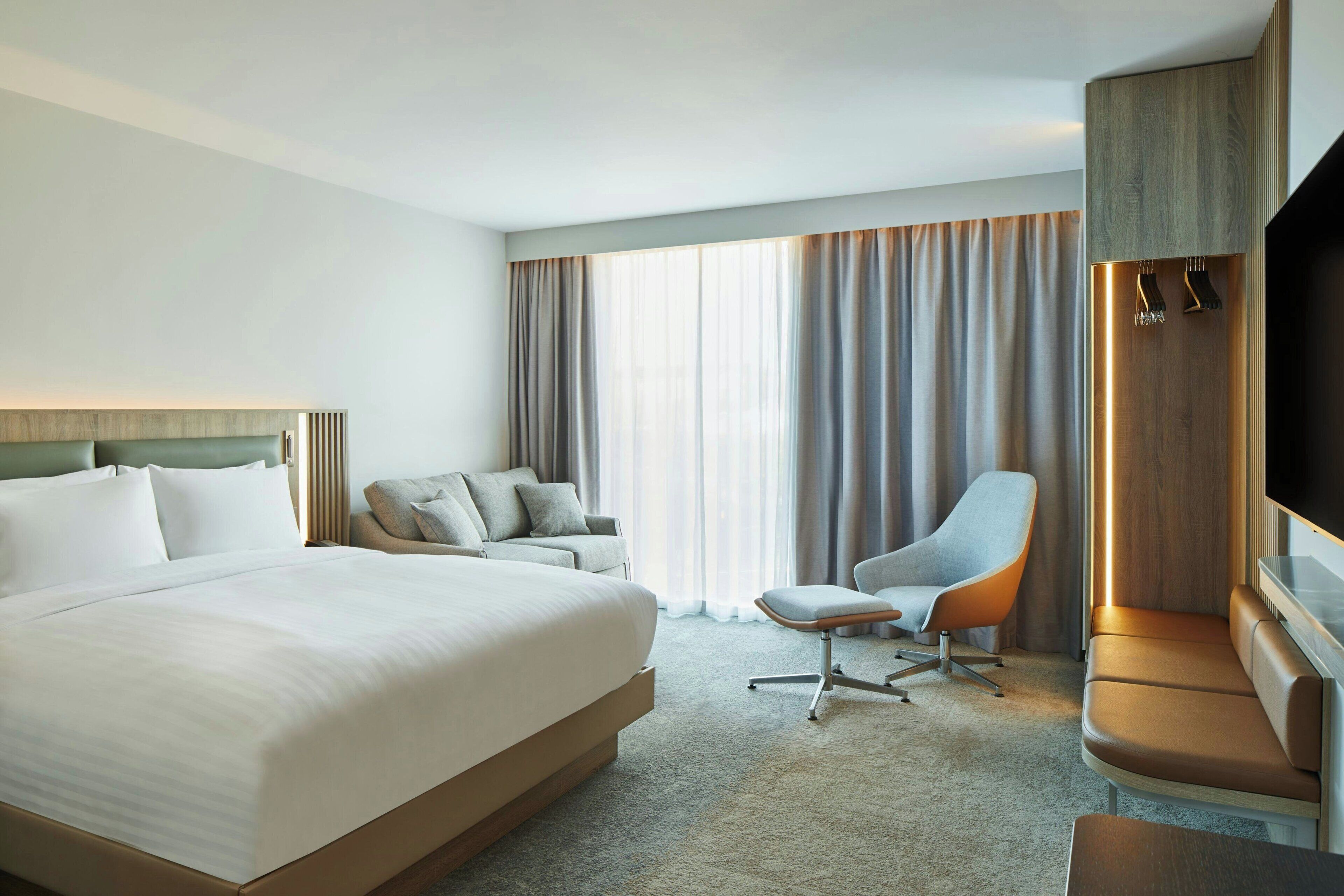 Habitación ejecutiva, 1 cama King size y sofá cama | Caja de seguridad en la habitación y escritorio 