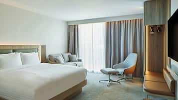 Habitación ejecutiva, 1 cama King size y sofá cama | Caja de seguridad en la habitación y escritorio