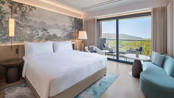 Luxe beddengoed, een minibar, een kluis op de kamer, een laptopwerkplek