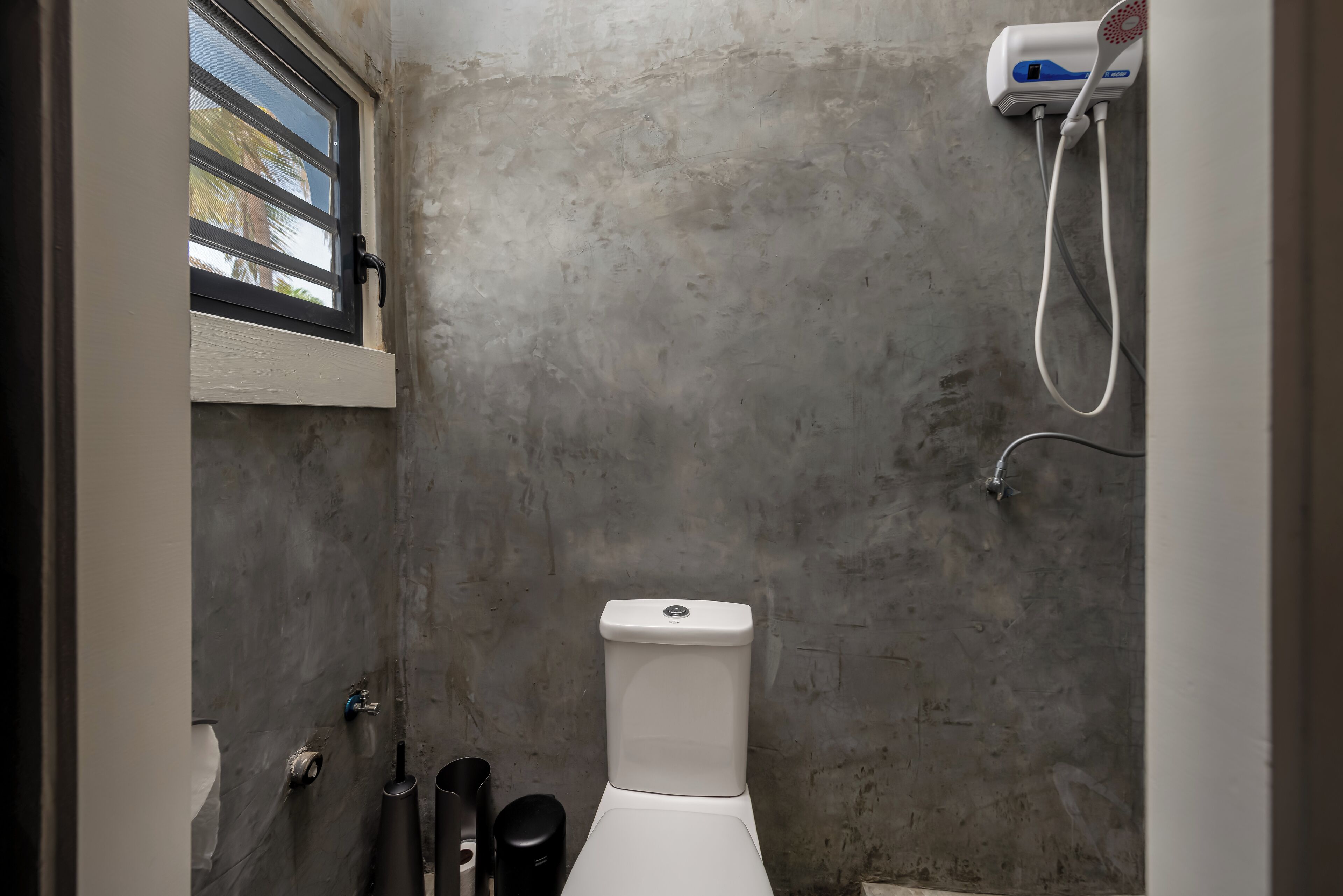 signature room, garden view | bathroom | towels, toilet paper