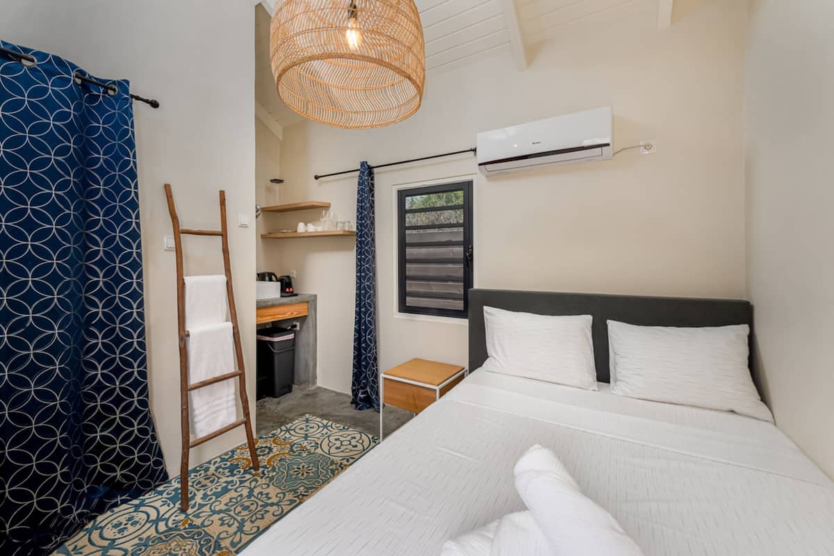 signature room, garden view | individually decorated, individually furnished, free wifi, bed sheets