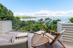 Terrace/patio - Koi Waiheke - Koi Waiheke is a stunning luxury holiday home in Omiha, Waiheke Island. With 4 bedrooms; 4 bathrooms; a large entertainer’s kitchen; spectacular ocean views; a private mooring; and a boat shed offering direct access to the ocean. This i (Waiheke Island)