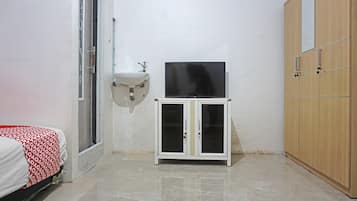 Desk, blackout curtains, bed sheets