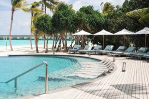 Outdoor pool, open 7:00 AM to 8:00 PM, pool umbrellas, sun loungers
