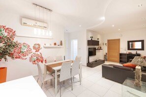 Appartement, 2 lits doubles | Restauration