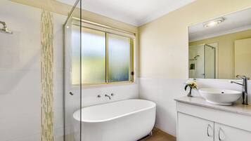 Bathtub, hair dryer, towels