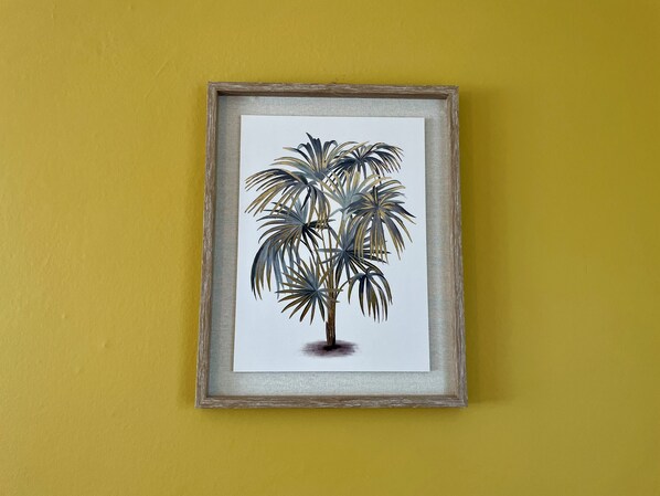 A framed botanical illustration on a yellow wall. - La Renaissance *** - Collection La 21ème Planche (Bayeux)
