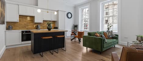 Luxury Apartment | Living area | 50-inch Smart TV with digital channels, TV