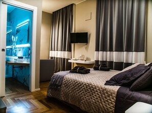 Comfort-værelse til 4 personer | Premium-sengetøj, dundyner, senge med madrasser af memory foam, minibar
