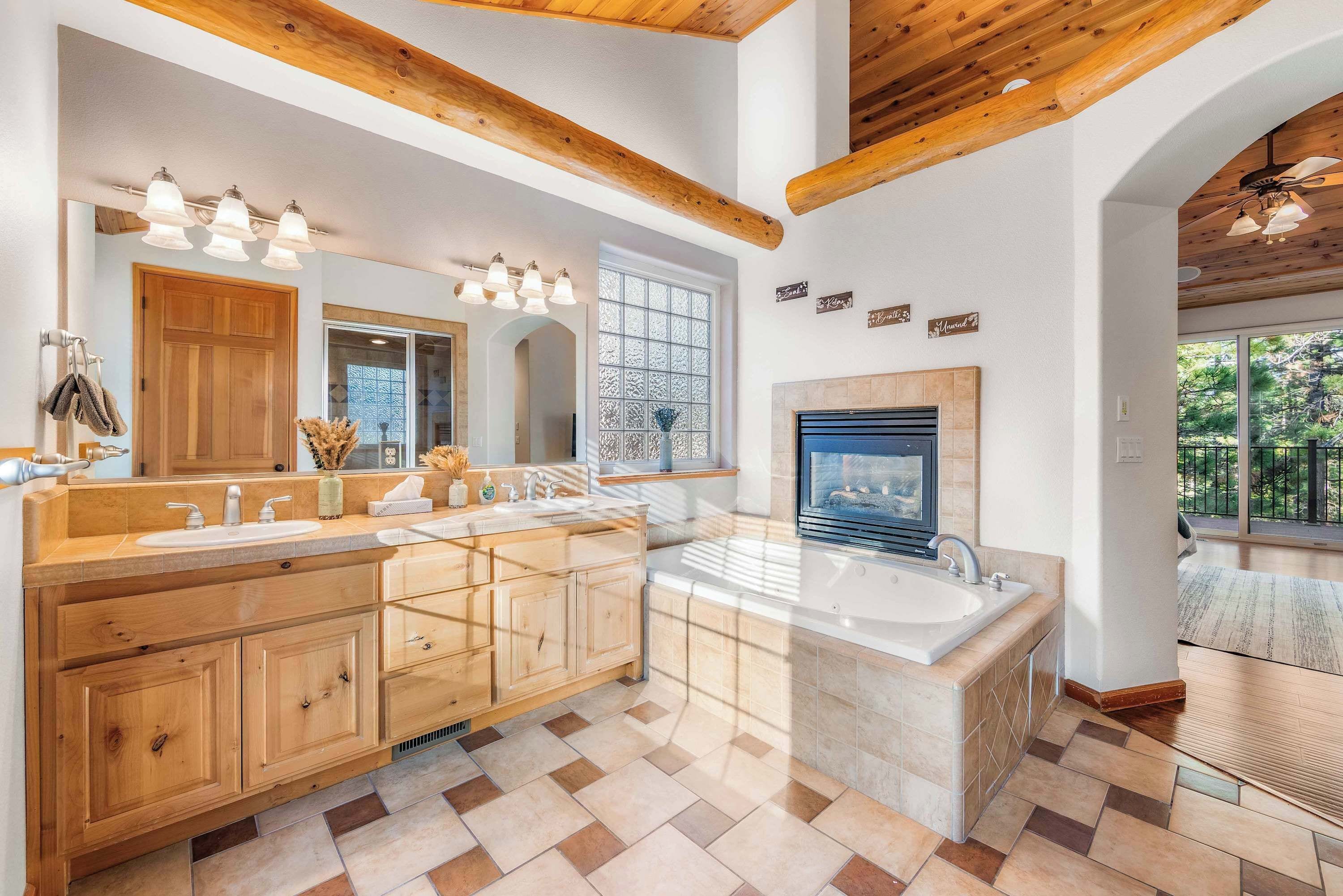Cabin, Multiple Beds, Hot Tub, Mountain View (The Lodge on Oaxaco) | Bathroom | Jetted tub, hair dryer, towels