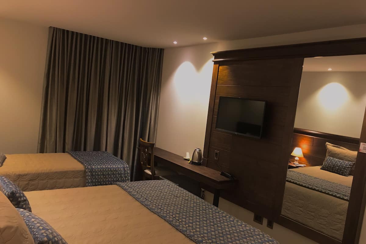 Hypo-allergenic bedding, minibar, in-room safe, desk