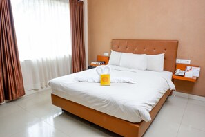 Habitación doble ejecutiva, 1 cama Queen size, vista a la ciudad | Wifi gratis y ropa de cama