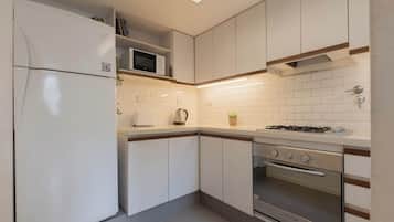 Microwave, coffee/tea maker, toaster, cookware/dishes/utensils