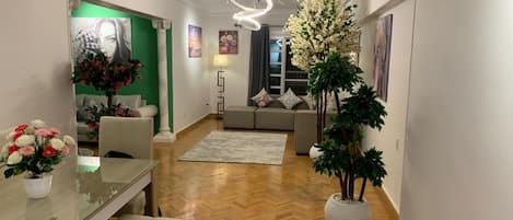 Grand Apartment | Living area | Flat-screen TV