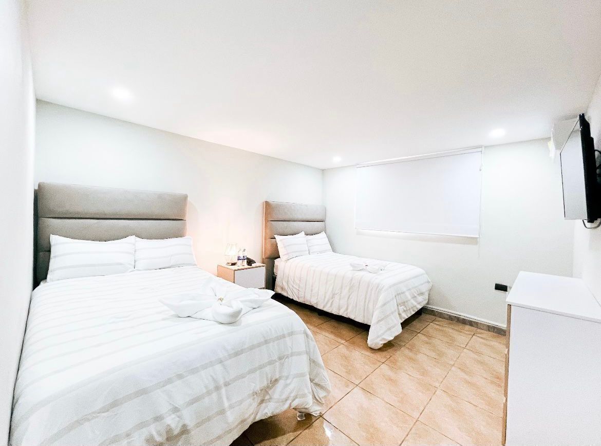Blackout drapes, free WiFi, bed sheets