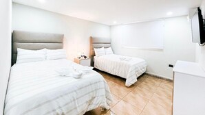 Habitación Doble Superior - 2 camas Dobles | 遮光カーテン、WiFi (無料)、ベッドシーツ