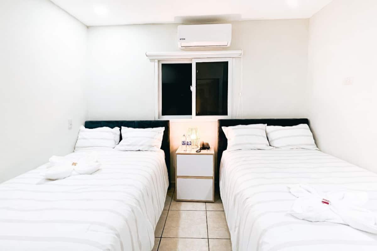 Blackout drapes, free WiFi, bed sheets