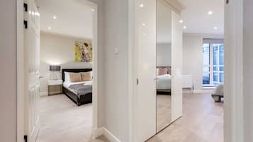 2 bedrooms, desk, laptop workspace, iron/ironing board