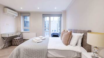 Basic Apartment, Multiple Beds | 2 bedrooms, desk, laptop workspace, iron/ironing board