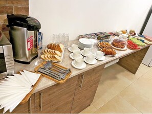 Daily buffet breakfast (USD 15 per person)