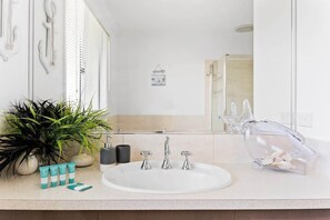 Bathtub, hair dryer