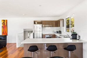 Coffee/tea maker, fridge, microwave, oven