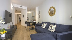 Apartemen Basic, Beberapa Tempat Tidur | Area keluarga | TV