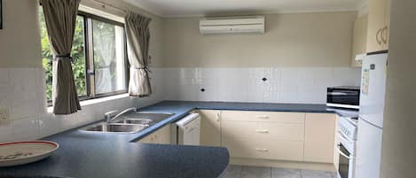 Microwave, dishwasher, dining tables