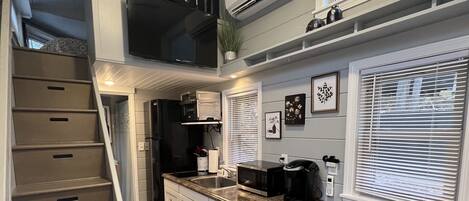 Fridge, microwave, stovetop, coffee/tea maker