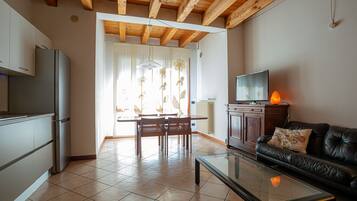 Comfort Apartment | Living area | Flat-screen TV