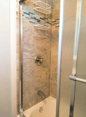 Shower, towels, soap, shampoo