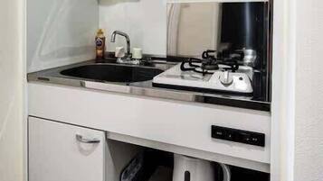 Fridge, microwave, stovetop, cookware/dishes/utensils