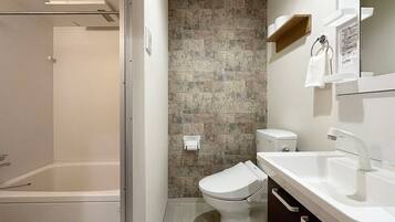 Bathtub, hair dryer, towels