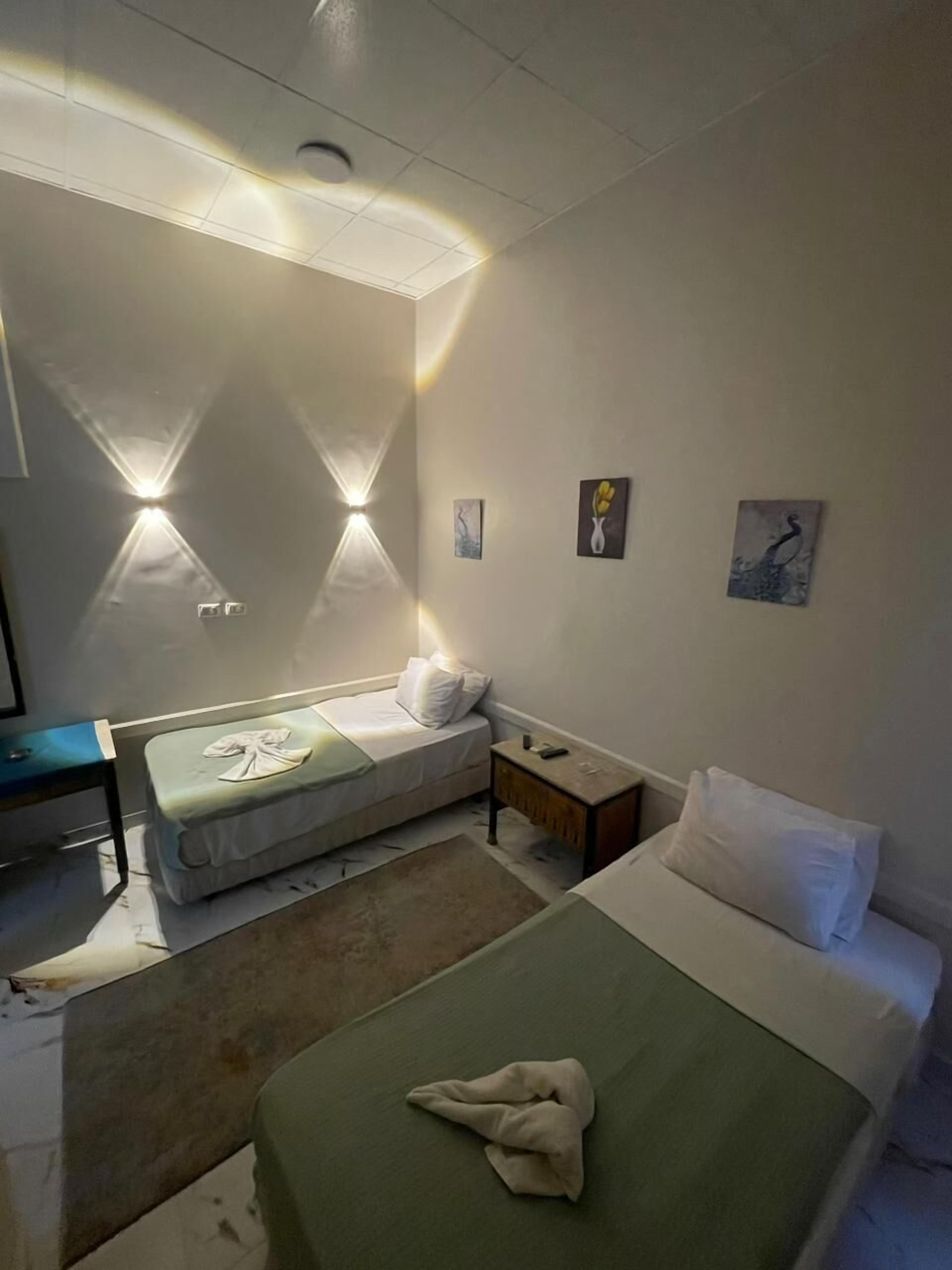 Habitación Deluxe doble, 2 camas individuales | Sábanas de algodón egipcio y ropa de cama de alta calidad