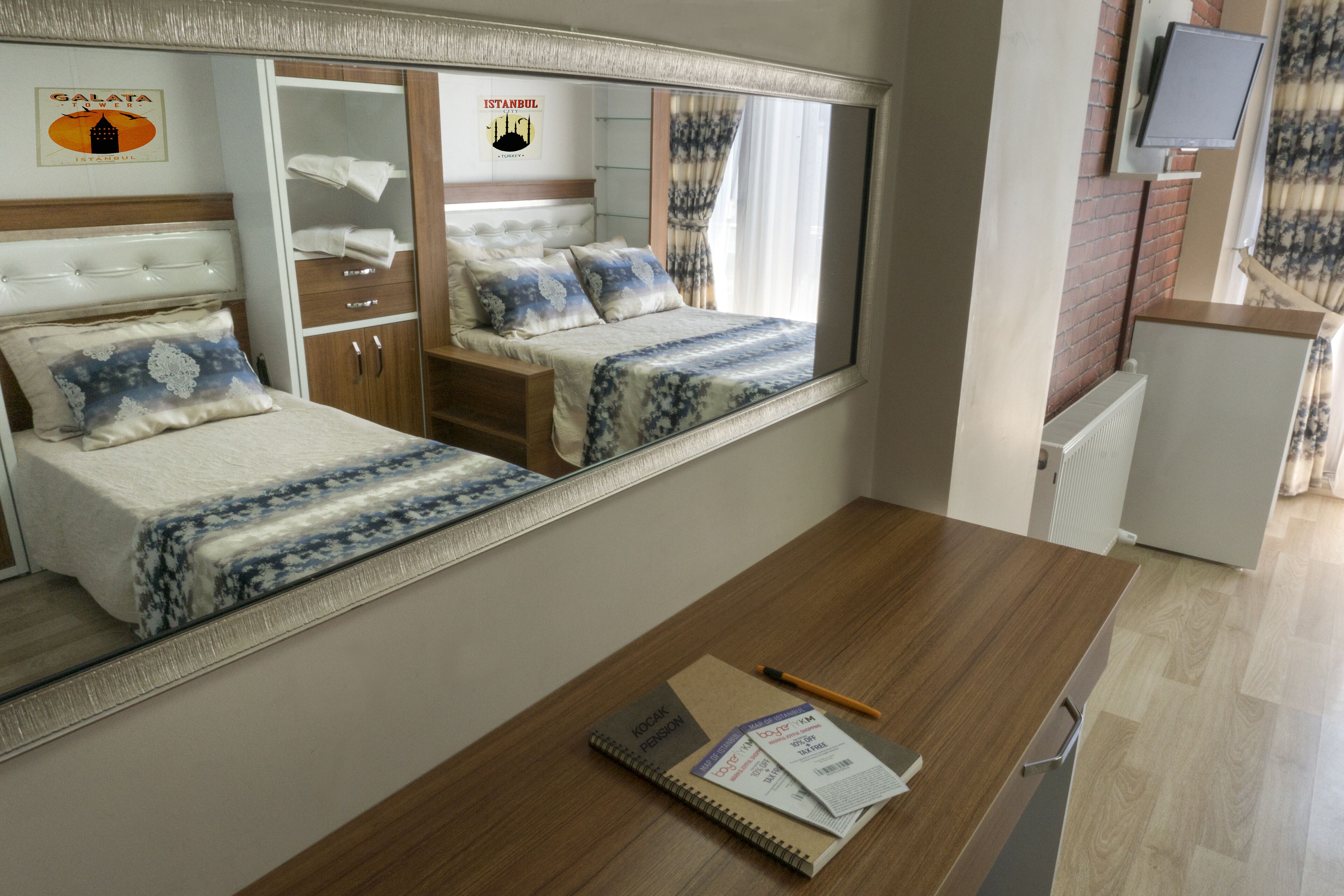 Desk, laptop workspace, free WiFi, bed sheets