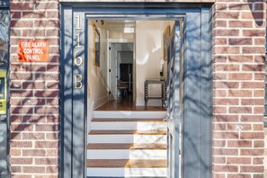 Exterior detail - The Feather | Next To Bad Bunnies Coffee (Charleston)