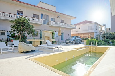 Mpoulakis Apt 64 with swimming pool around it, in the most convenient location