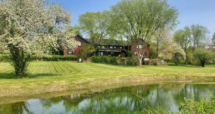 The Old Orchard Home Is Surrounded By A Small Apple Orchard, Large Meadows, And A Private Pond 5 Bedroom Home by RedAwning