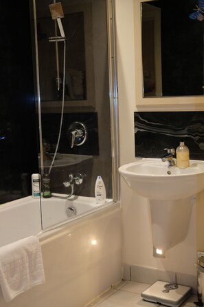 Shower, free toiletries, towels, soap